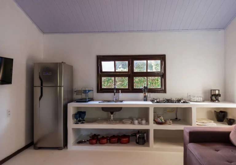 Equipped kitchen with refrigerator and stove in Azorai's Chalet for 6