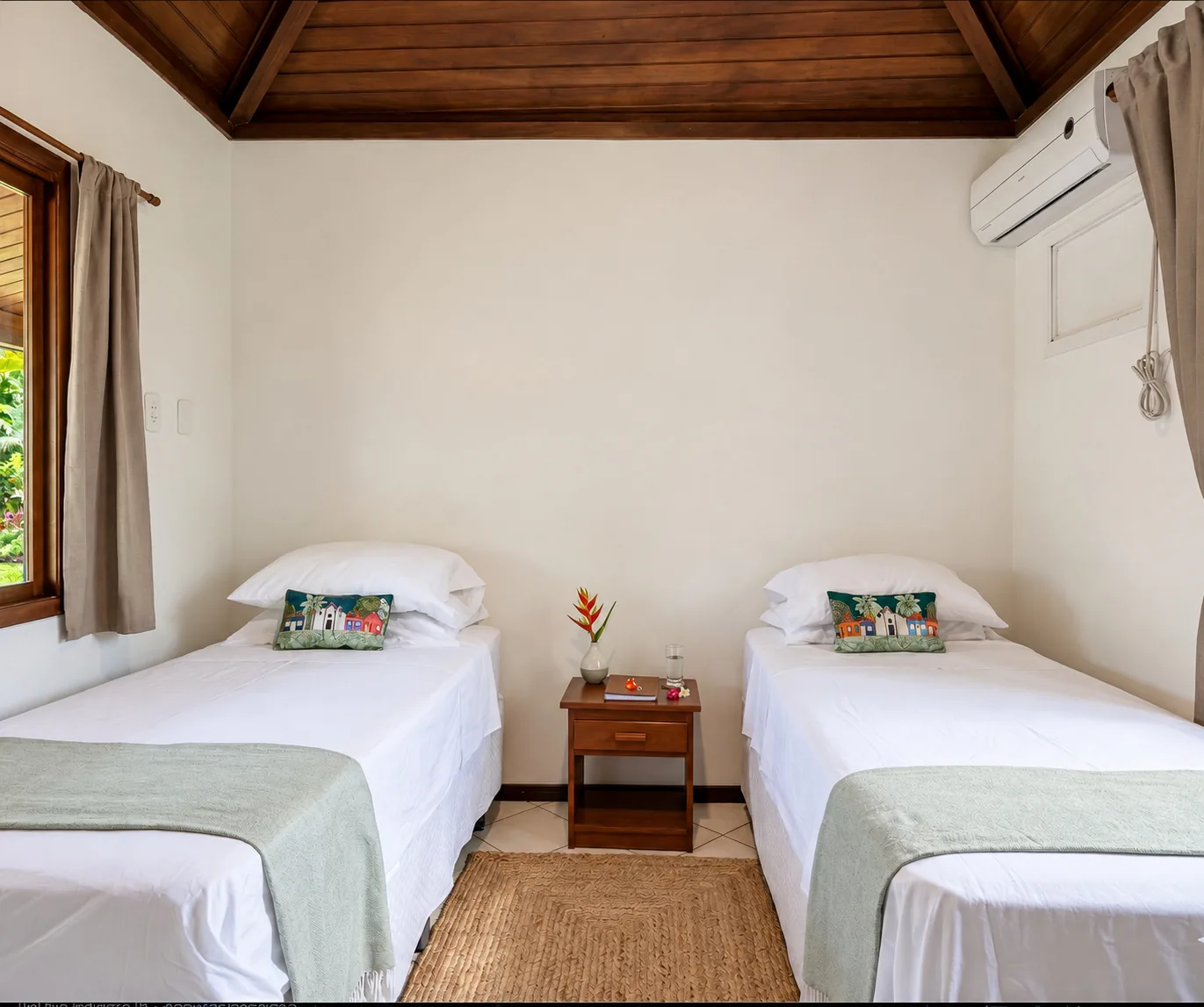 Chambre avec deux lits simples dans la Suite Familiale de l’Azorai