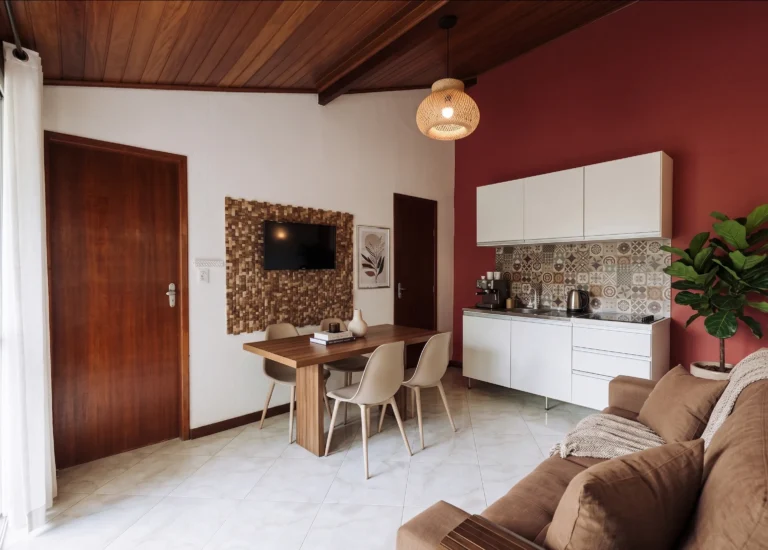 Living room with equipped kitchen and dining table in Azorai's Chalet for 5